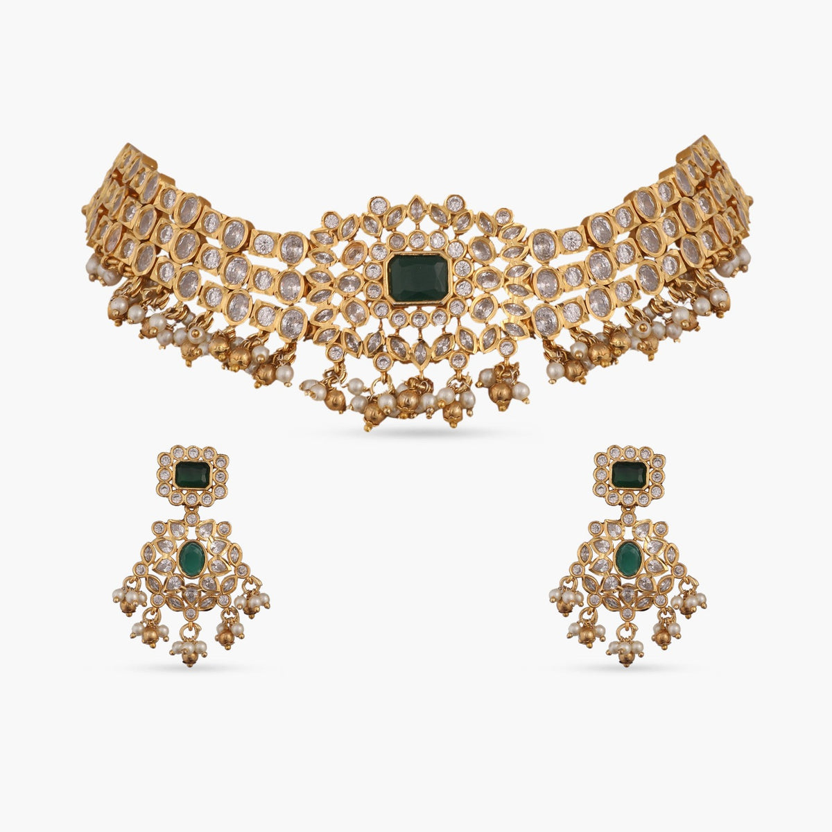 A picture of an Indian artificial choker set with earrings embellished with green gemstones and Cubic Zirconia.