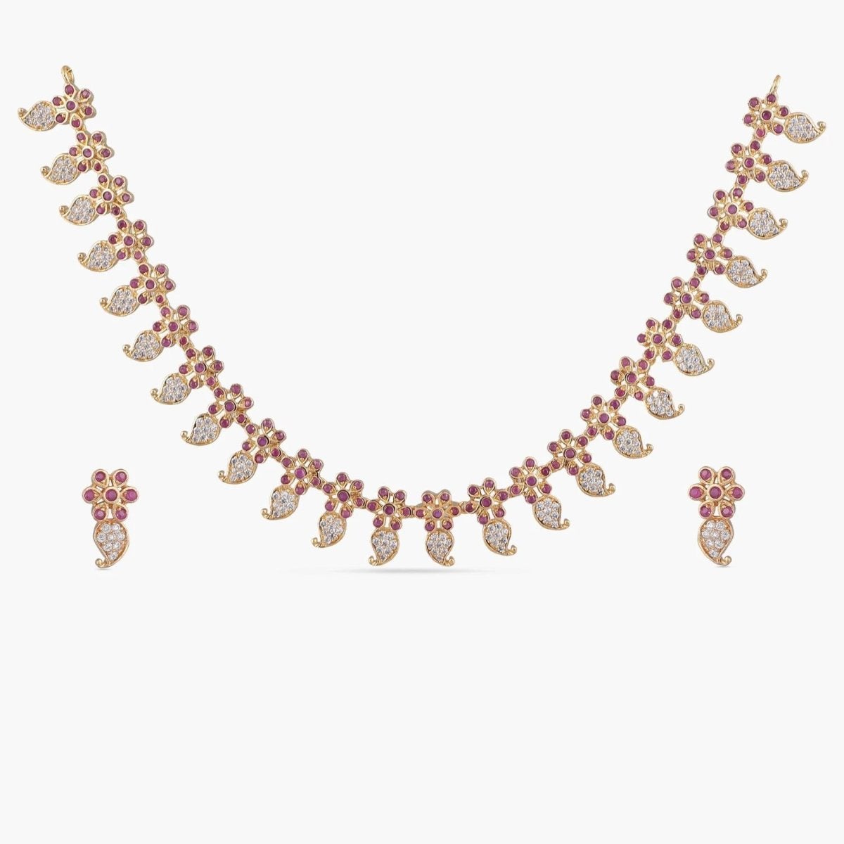 A picture of an Indian artificial jewelry set: a gold-plated necklace and earrings featuring teardrop-shaped red gemstones with Cubic Zirconia on a white background. 